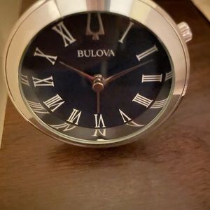 New Bulova travel clock, new with tag, silver with black, retails for $100
